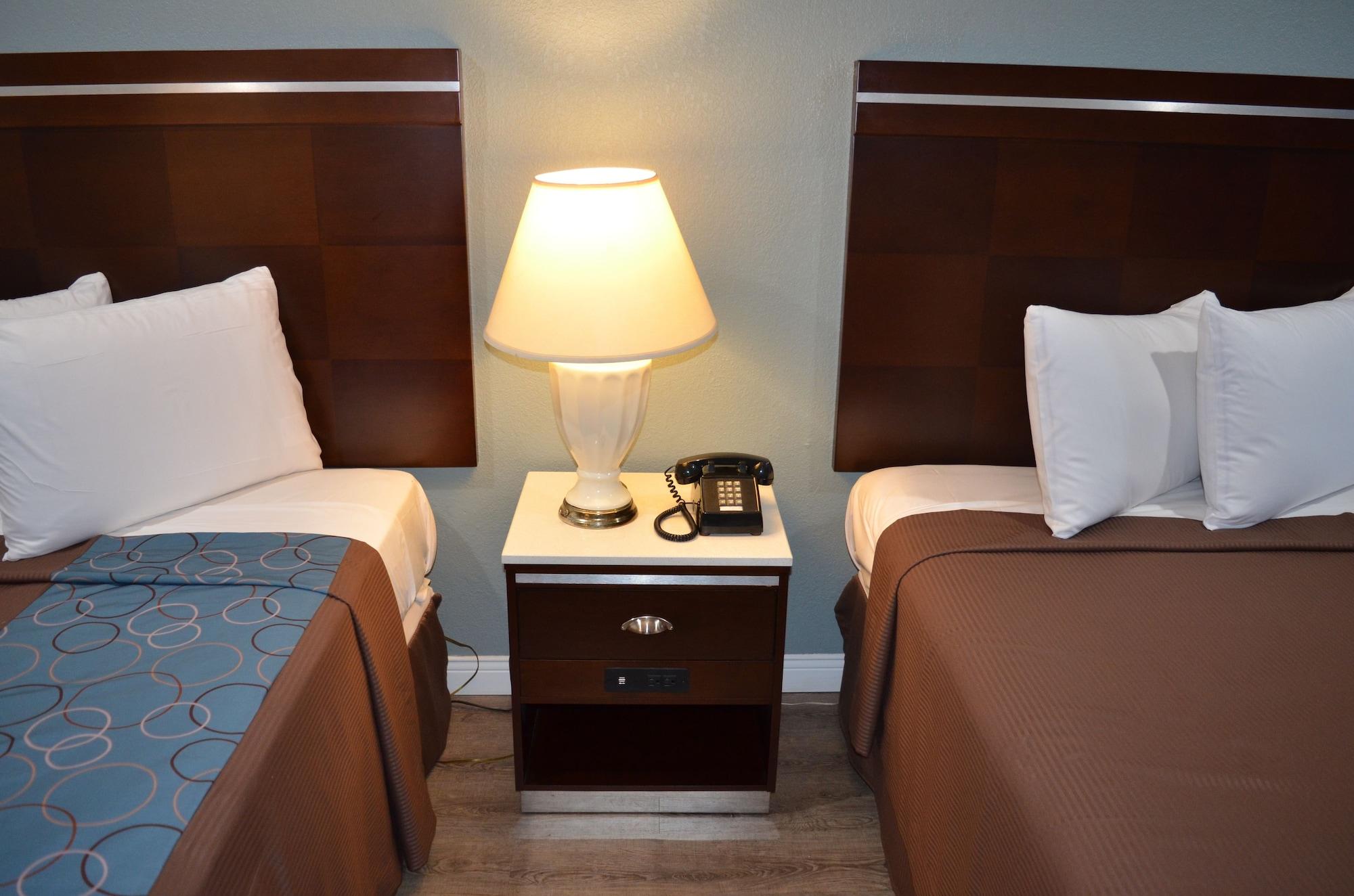 Welcome Inn Corona Bagian luar foto